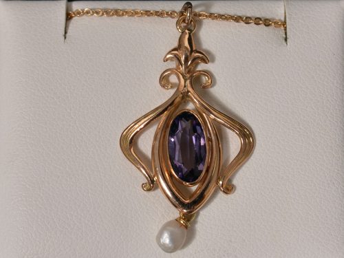 Lady’s 14K Yellow Gold, Pearl and Oval Amethyst Pendant Necklace available at John Wallick Jewelers in Sun City, Arizona near Phoenix, AZ