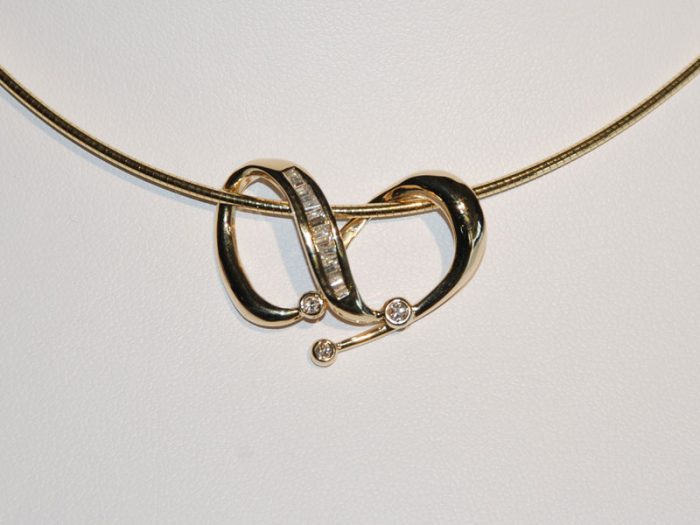 John Wallick Jewelers: Yellow Gold Diamond Pendant and Omega Chain Necklace