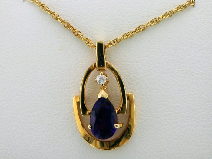 Pear Shaped Amethyst and One Diamond Pendant Necklace at John Wallick Jewelers in Sun City, Arizona near Phoenix, AZ